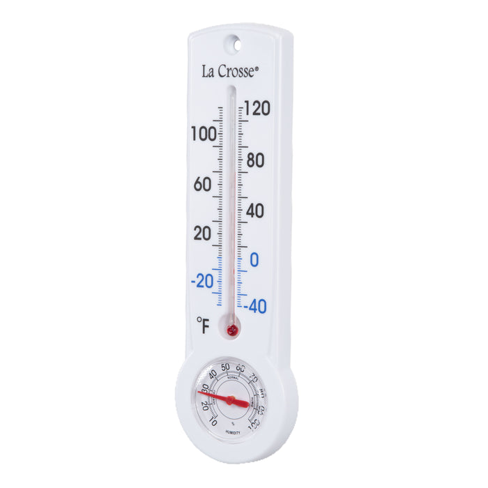 Left-facing image of the 204-109 8.75-inch Thermometer with Hygrometer and Key Hider, constructed in a white case. The mercury-free capillary thermometer has a Fahrenheit temperature scale. Temperature markings below freezing appear in blue text, while those above freezing appear in black text. The Hygrometer dial reads 10-100 percent humidity, with a red pointer.