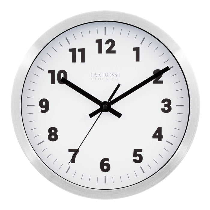 Head on view of the Nash 404-2626 Wall Clock with a silver metal flush mount frame surrounding a white dial with black numbers, hour, minute and second hands and gray time markings