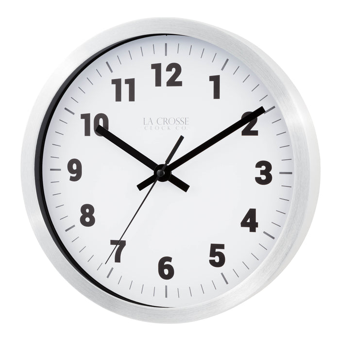 Left facing view of the Nash 404-2626 Wall Clock with a silver metal flush mount frame surrounding a white dial with black numbers, hour, minute and second hands and gray time markings