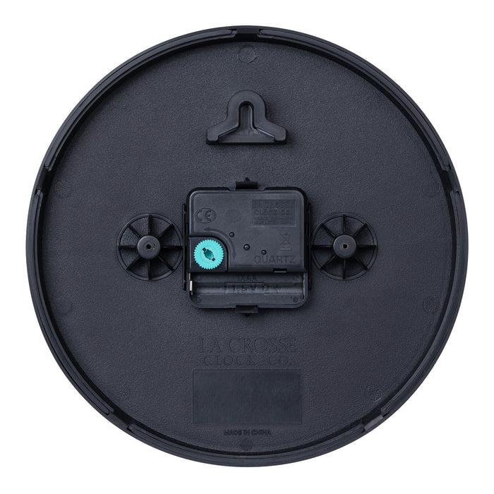 Back image of the 404-3020B-4TZ Four Pack 8-inch Basic Wall Clock with City Plaques showing the battery compartment, the quartz movement, and the hanging hole.
