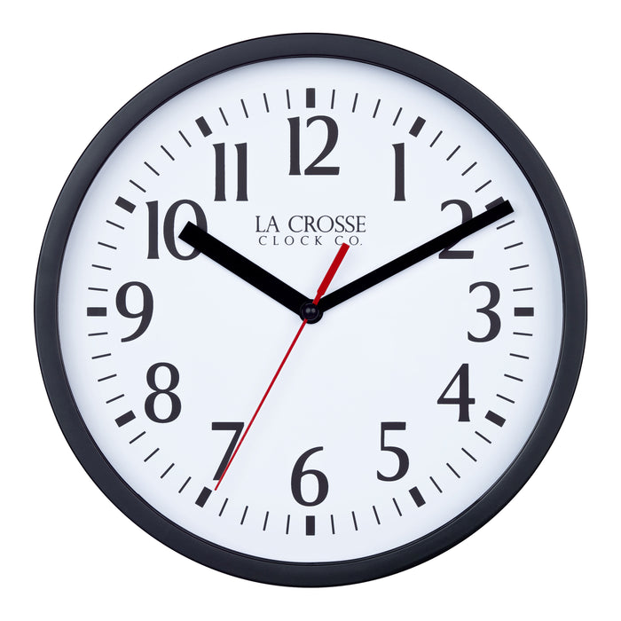 Head-on image of the 404-3020B-4TZ Four Pack 8-inch Basic Wall Clock with City Plaques. The clock features a black frame with a white clock face, black numbers, black hour and minute hands, and a red second hand.
