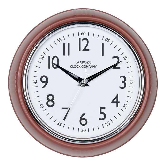 Head-on image of the 404-3024TC 9.5-inch Diner Clock – Terracotta. The clock features a retro-style terracotta frame with a white dial, chrome bezel, black numbers and minute markings, black metal hands, and a silver second hand.