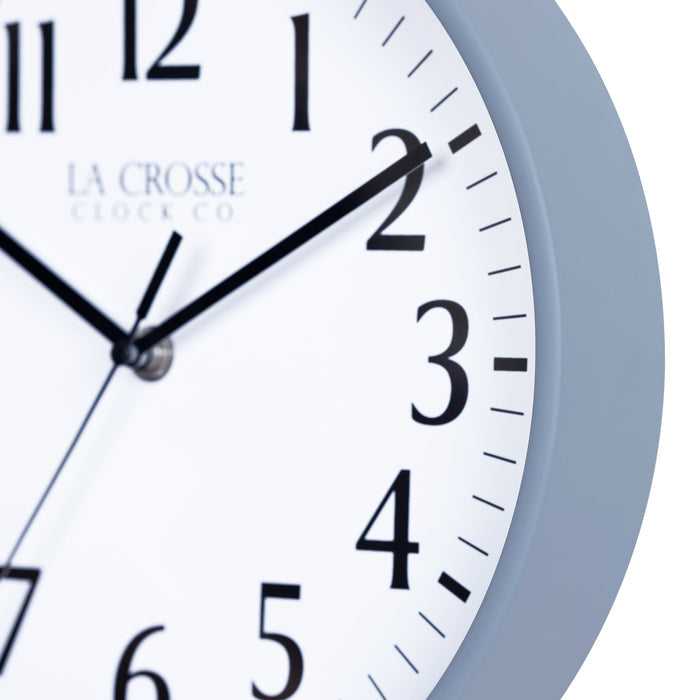 Close-up image of the Gray Blue frame of the 404-3025GB 10-inch Basic  Wall Clock - Gray Blue featuring a white dial, with black numbers, hour, minute, and second hands