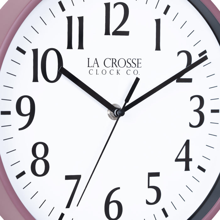 Close-up image of the dial of the 404-3025RR 10-inch Basic Decor Wall Clock with a Ruby Red Rose frame, white dial with black numbers, hour, and minute hands, and a black second hand