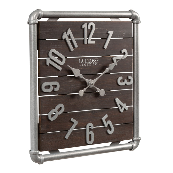 Right-facing image of the 404-3412L 16-inch Foundry Metal & Wood Wall Clock - Light. The clock features a square metal pipe frame in a weathered pewter finish, a truffle-brown-stained wood slat clock face with pewter-finished metal numbers and hands.