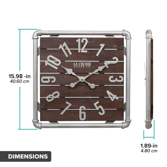 Dimension image in inches and centimeters of the 404-3412L 16-inch Foundry Metal & Wood Wall Clock - Light. The clock features a square metal pipe frame, stained wood slats, and metal pewter finish accents. The clock is 15.98 inches square and 1.89 inches deep.
