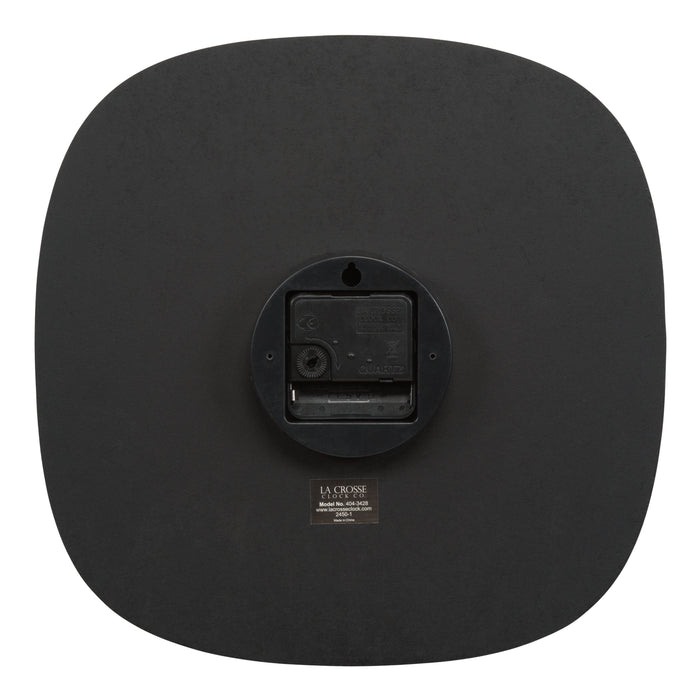 Back of the Sylvie 404-3428 wall clock showing the battery compartment and the La Crosse Clock brand quartz movement