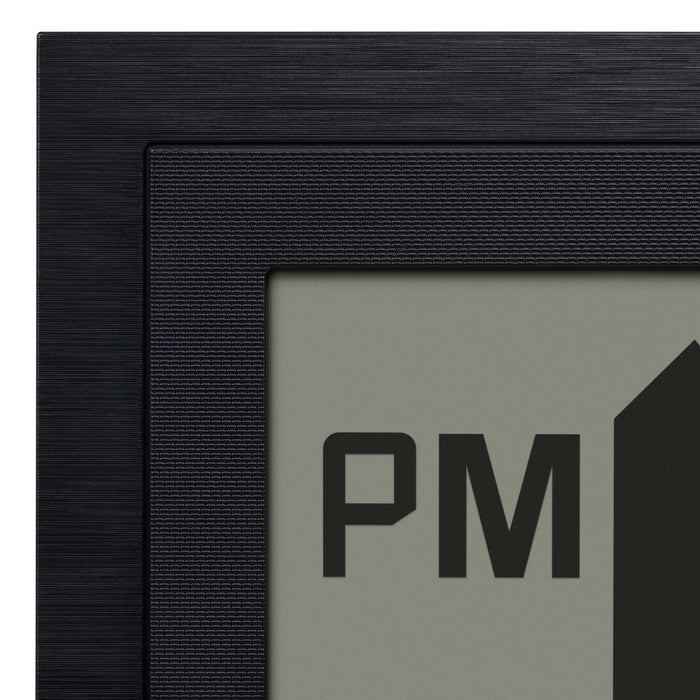Close-up image of the frame of the 515-1419v2 Atomic Digital Wall Clock with Time Advance. The digital wall clock detail shows the textured dual black frame.