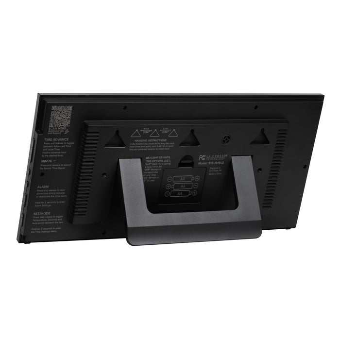 Back image of the 515-1419v2 Atomic Digital Wall Clock with Time Advance showing the built-in kickstand, the three hanging holes, and the battery compartment with basic instructions screenprinted on the back of the clock.