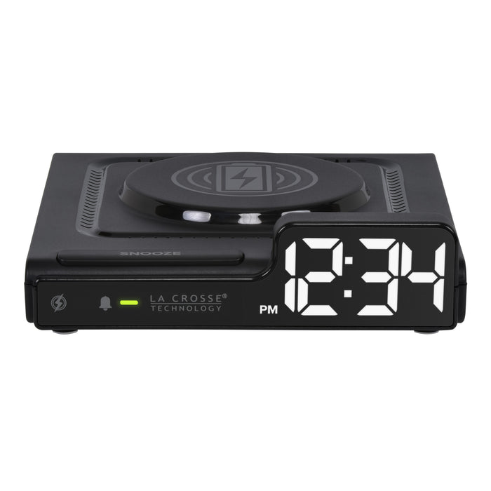 Head-on image of the 617-143 Amp Mini 15W Wireless Charging LED Alarm Clock. The alarm clock features a wireless charging pad, easy access buttons, an alarm with snooze, white time digits, and LED status light.