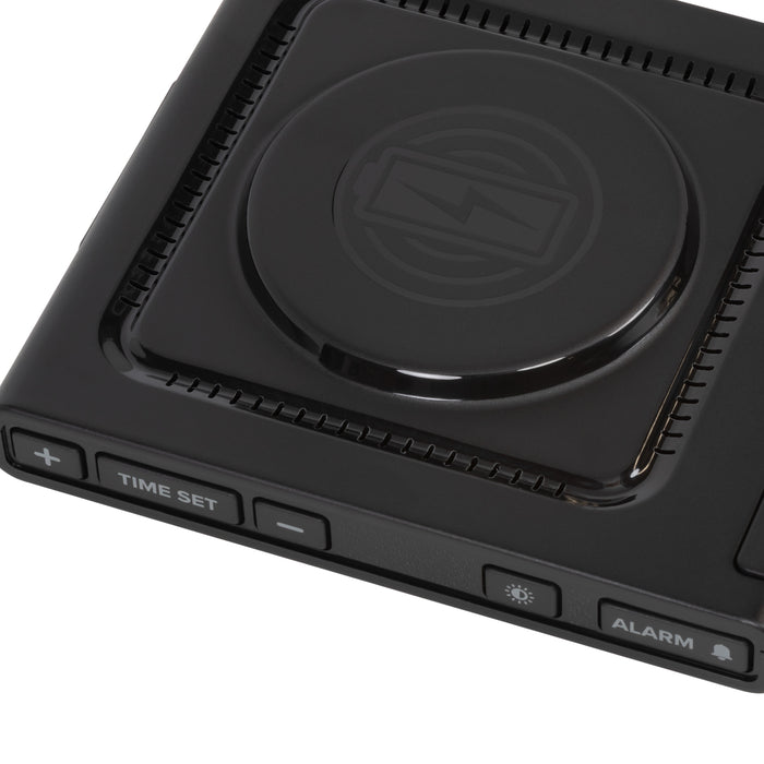 Close-up detail image of the 617-143 Amp Mini 15W Wireless Charging LED Alarm Clock showing the wireless charging pad and easy access buttons.