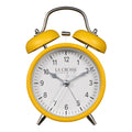 Head-on image of the 617-3314MY Metal Twin Bell Alarm Clock – Mustard Yellow, the clock features a white dial with black numbers, silver hands and accents, in a mustard yellow metal case.
