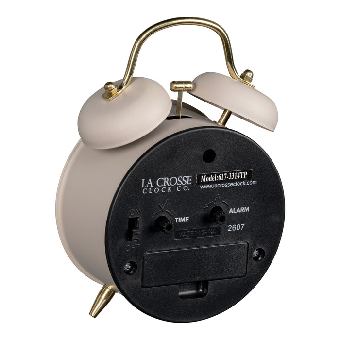 Angled back image of the 617-3314TP Metal Twin Bell Alarm Clock – Taupe, showing the battery compartment, knobs, and the on/off switch.