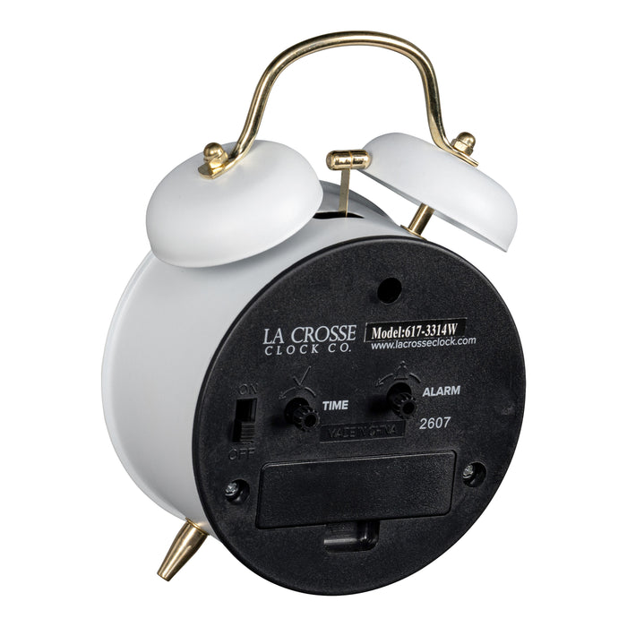 Angled back image of the 617-3314W Metal Twin Bell Alarm Clock – White, showing the battery compartment, knobs, and the on/off switch.