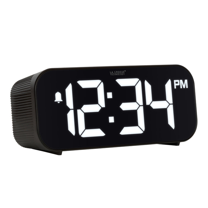 Right-facing image of the 617-714 Insta-Set Digital LED Alarm Clock with Bluetooth® Technology - Black. The alarm clock features large white digits, a PM indicator, and an alarm icon in a black case.