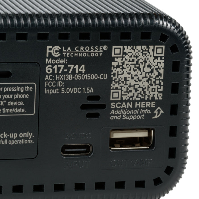Close-up image of back of the 617-714 Insta-Set Digital LED Alarm Clock with Bluetooth® Technology in Black, showing the USB-C power port, the USB-A charging port, and a WR code for support.