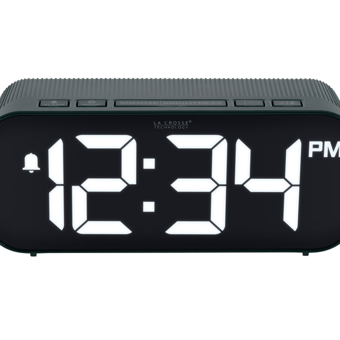 Close-up image of the buttons of the 617-714G Insta-Set Digital LED Alarm Clock with Bluetooth® Technology - Green. The alarm clock features large white digits, a PM indicator, and an alarm icon in a green case.