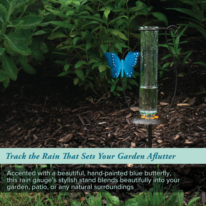 704-71077 Rain gauge with blue butterfly accent in a garden setting