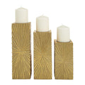 COSMOPOLITAN GOLD WOOD GEOMETRIC CARVED PILLAR CANDLE HOLDER, SET OF 3