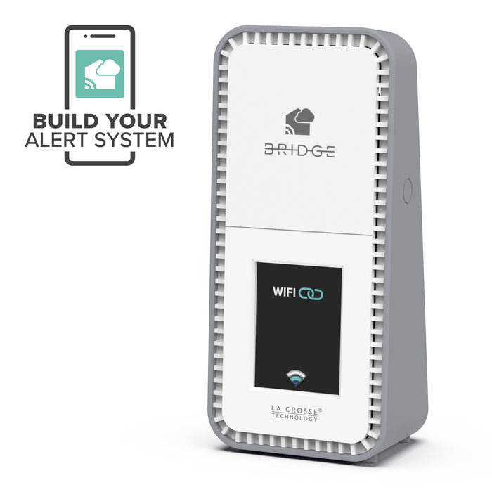 White and gray La Crosse Technolgy alert and montoring Bridge gateway facing left with text Build Your Own System